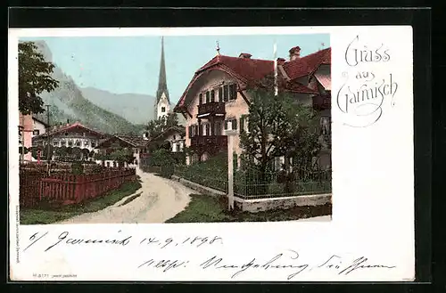 AK Garmisch, Partie Strasse mit Kirche