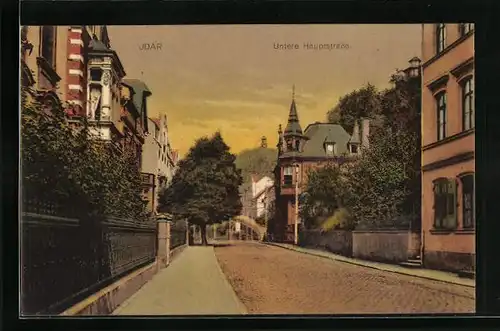 AK Idar, Untere Hauptstrasse im Abendrot