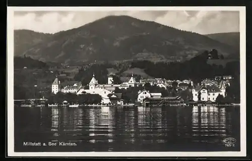 AK Millstatt am See, Ortsansicht mit spiegelndem Wasser