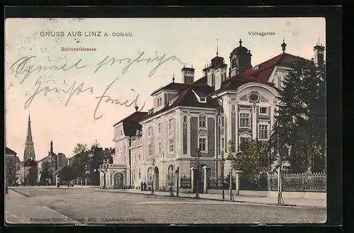 AK Linz a. Donau, Bahnhofstrasse mit Volksgarten und Kirche