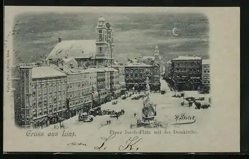 Mondschein-AK Linz, Franz Josefs-Platz mit Geschäften und der Domkirche im Winter