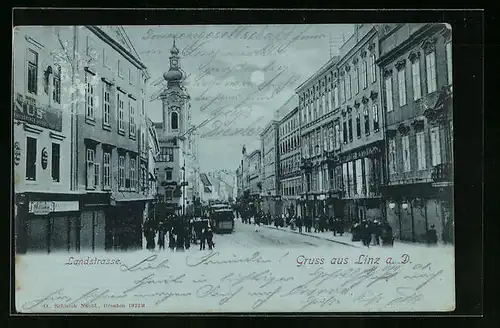 Mondschein-AK Linz a. D., Landstrasse mit Passanten