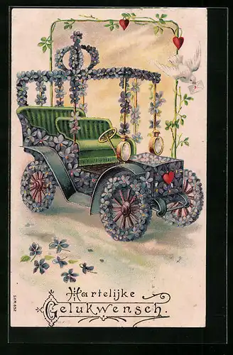 Präge-AK Veilchengeschmücktes Auto, Blumenbild