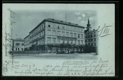 Mondschein-AK Linz a. D., Hotel Erzherzog Karl, Strassenpartie