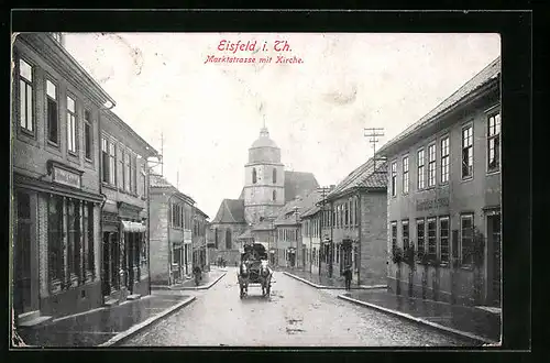 AK Eisfeld /Th., Marktstrasse mit Kirche und Pferdekutsche