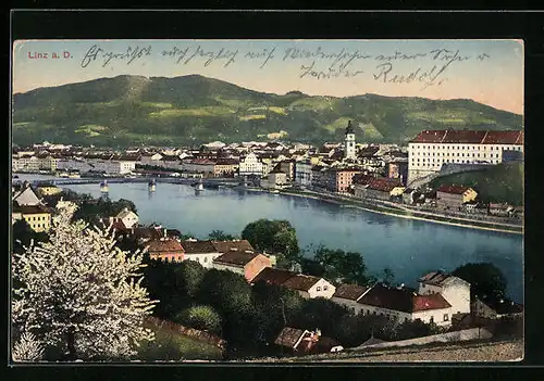 AK Linz a. D., Bebautes Ufer der Stadt mit Brücke