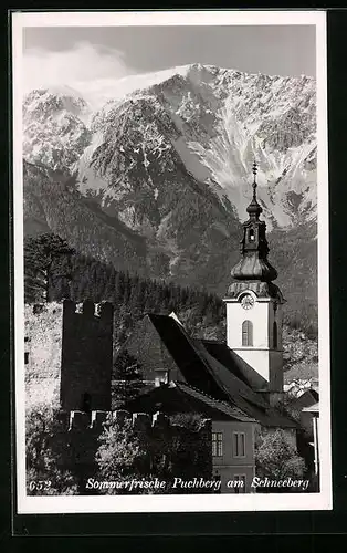 AK Puchberg am Schneeberg, Kirche im Ortsbild, Blick zum Gebirge