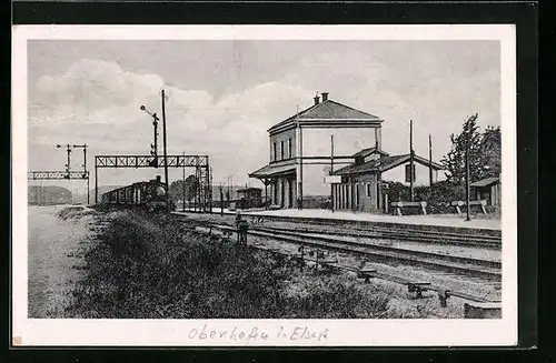 AK Oberhofen i. Elsass, Einfahrende Dampflokomotive am Bahnhof