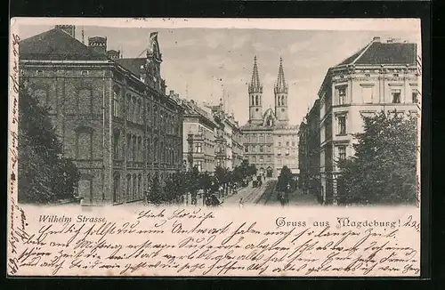 AK Magdeburg, Wilhelmstrasse mit Blick auf einen Doppelturm