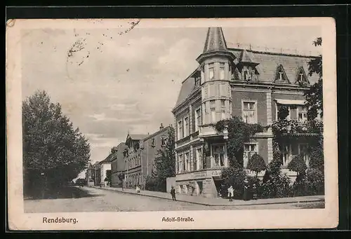 AK Rendsburg, Adolf-Strasse mit Geschäft
