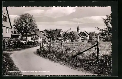 AK Oberkollbach / Schwarzwald, Teilansicht mit Kirche im Hintergrund