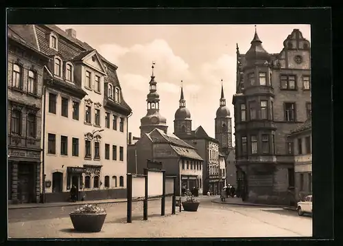 AK Lutherstadt Eisleben, Sangerhausener Strasse mit Kirche