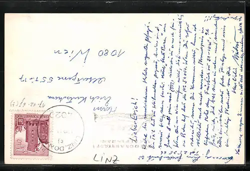 AK Linz a. D., Ortspartie mit Denkmal und Weihnachtsbaum