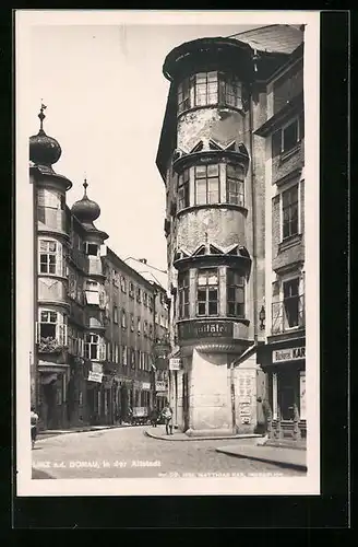 AK Linz a. d. Donau, Strassenpartie der Altstadt mit Bäckerei