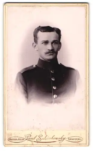 Fotografie Paul Schinkowsky, Graudenz, Soldat in dunkler Uniform mit Moustache