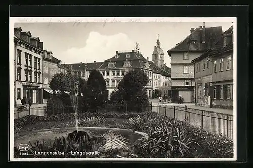 AK Langensalza, Langestrasse mit Gasthaus Zum Schwan, Geschäften und Brunnen