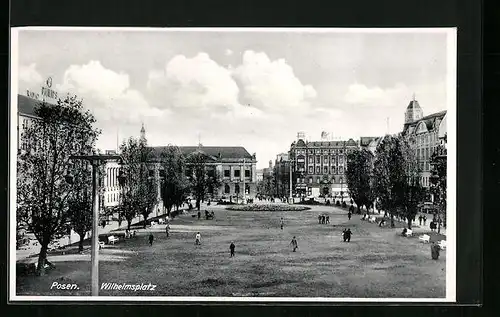 AK Posen, Wilhelmsplatz mit Spaziergängern