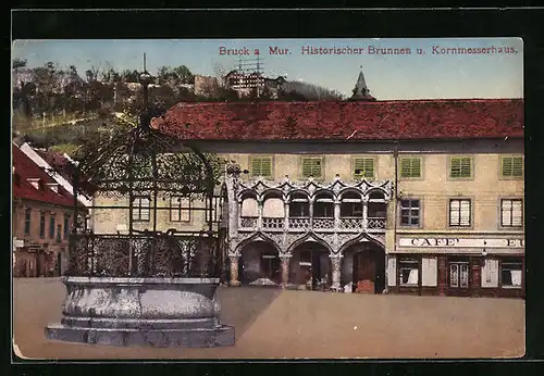 AK Bruck a. Mur, Historischer Brunnen un Kornmesserhaus