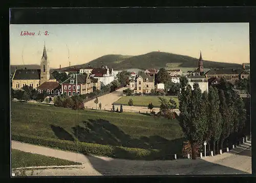 AK Löbau i. S., Strassenpartie mit Kirche