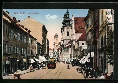 AK Linz a. D., Landstrasse mit Strassenbahn