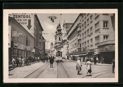 AK Linz a. D., Strassenpartie mit Strassenbahn