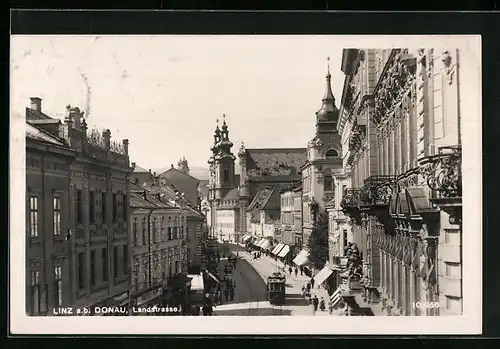 AK Linz a. d. Donau, Landstrasse mit Strassenbahn