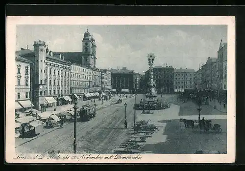 AK Linz a. D., Platz des 12. November mit Domkirche und Strassenbahn