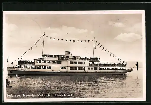 AK Neuestes Motorschiff Deutschland in Flaggengala auf dem Bodensee
