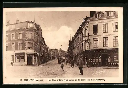 AK St-Quentin, La Rue d`Isle, Strassenbahn