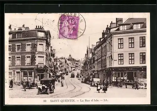 AK St-Quentin, La Rue d`Isle, Strassenbahn