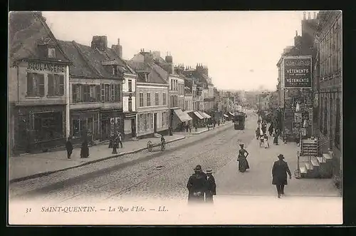 AK St-Quentin, La Rue d`Isle, Strassenbahn