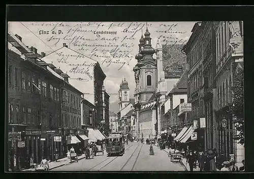 AK Linz a. D., Landstrasse mit Strassenbahn