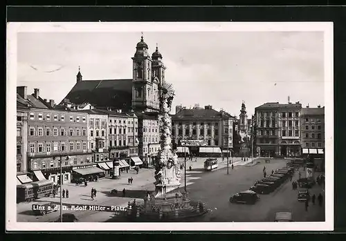 AK Linz a. d. D., Strassenbahn auf dem platz, Pestsäule und Kirche