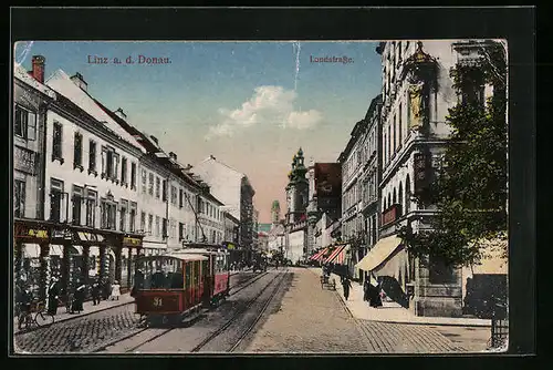 AK Linz a. d. Donau, Strassenbahn und Geschäfte in der Landstrasse