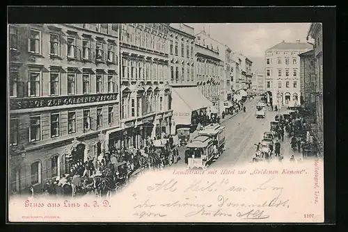 AK Linz a. D., Strassenbahn passiert das Hotel zur Goldenen Kanone, Landstrasse