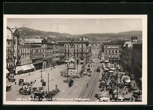 AK Linz a. d. Donau, Platz des 12. November mit Pöstlingberg, Strassenbahn