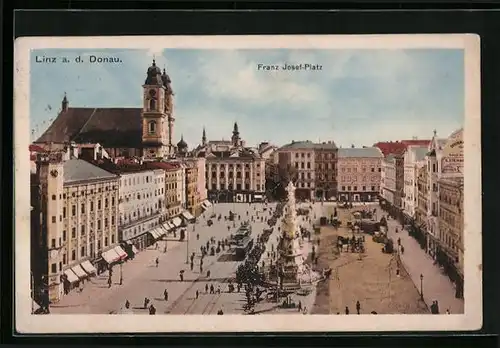 AK Linz a. d. Donau, Franz Josef-Platz mit Denkmal und Strassenbahn