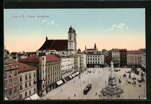 AK Linz a. D., Franz Josef-Platz mit Kirche und Denkmal, Strassenbahn