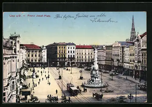 AK Linz a. D., Franz Josef-Platz mit Geschäften und Denkmal, Strassenbahn