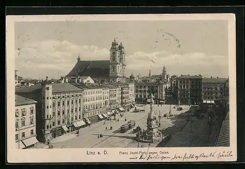 AK Linz a. D., Franz Josef-Platz mit Kirche, Denkmal und Strassenbahn gegen Osten