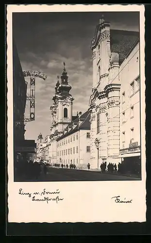 AK Linz a. Donau, Landstrasse mit Kirche