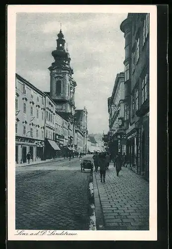 AK Linz a. d. Donau, Landstrasse mit Geschäften