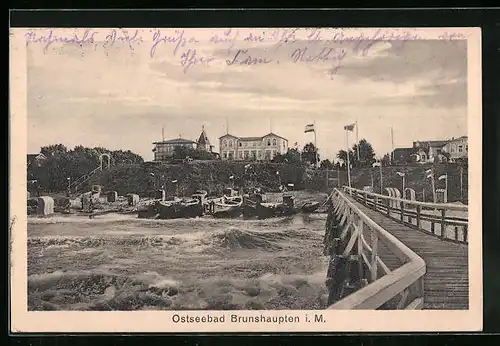 AK Brunshaupten i. M., Uferpartie mit Brücke und Booten