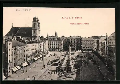 AK Linz a. d. D., Franz Josef-Platz mit Geschäften und Denkmal, Strassenbahn