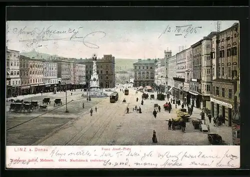 AK Linz a. Donau, Franz Josef-Platz mit Geschäften und Denkmal, Strassenbahn