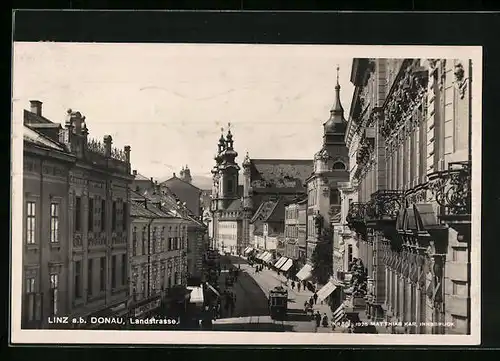AK Linz a. d. Donau, Landstrasse mit Strassenbahn