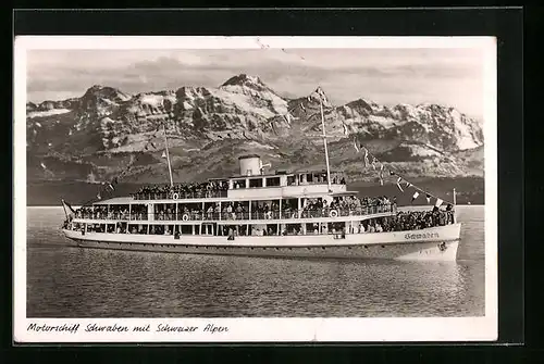 AK Motorschiff Schwaben in Flaggengala auf dem Bodensee mit Schweizer Alpen