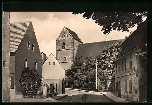 AK Belgern /Elbe, Kirchstrasse mit Kirche