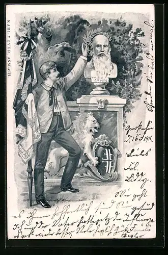 Künstler-AK Mann mit Fahne legt Lorbeerkranz um Büste des Turnvaters Jahn