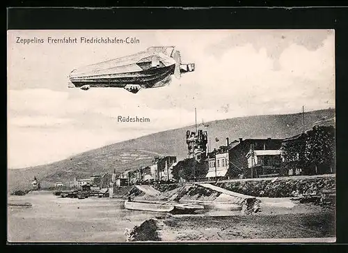 AK Rüdesheim, Ortsansicht mit Zeppelin auf Fernfahrt von Friedrichshafen nach Cöln